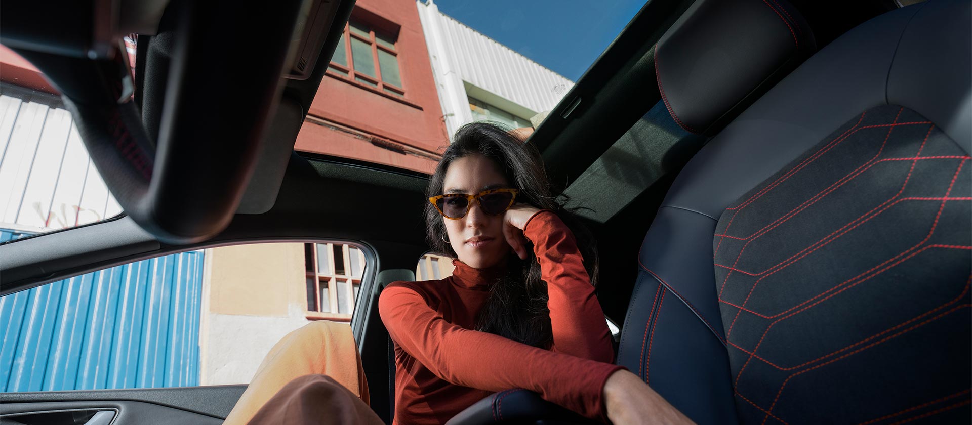 Woman sitting in Ford Puma® with Panoramic roof view